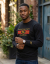 Gray chest logo sweatshirt from Something Light Clothing featuring a prominent Gemini graphic on the front.