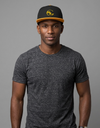 Blue SLC™ Snapback Hat with flat brim and adjustable strap, featuring a stylish Gemini graphic on the front.
