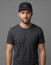 Black SLC™ Snapback Hat with flat brim and adjustable strap, featuring a sleek design from Something Light Clothing.