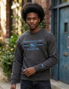 Gray chest logo sweatshirt from Something Light Clothing featuring a simple design and comfortable fit.