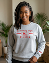 Light gray SLC™ embroidered sweatshirt with subtle branding and comfortable crewneck design, perfect for casual wear.
