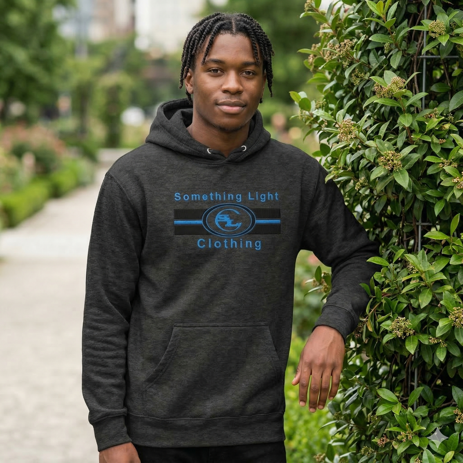Gray chest logo hoodie from Something Light Clothing featuring a front chest graphic and comfortable casual fit.